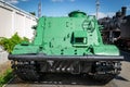 Green armored tracked military tractor