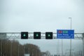 Green arrow above the driving lane indicating that its open on motorway A12 E30 heading Den Haag en Zoetermeer.