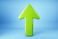 Green arrow pointing upward on a blue background. 3D Rendering Royalty Free Stock Photo