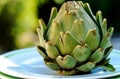 Green Artichoke on Blue and White Plate - Fresh Organic Vegetable Decoration Concept