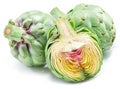 Green artichokes and artichoke heart isolated on white background Royalty Free Stock Photo