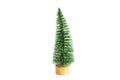 Green artificial Christmas tree in the shape of a triangular brush on a white background, isolate. Christmas, new year, symbol of Royalty Free Stock Photo