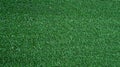 Green artificial grass. Football field, lawn, golf course, landscaping. Use for textures and backgrounds. Royalty Free Stock Photo
