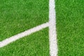 Green artificial grass turf soccer football field background with white line boundary. Top view Royalty Free Stock Photo
