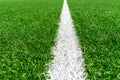 Green artificial grass turf soccer football field background with white line boundary. Top view Royalty Free Stock Photo