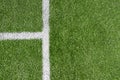 Green artificial grass turf soccer football field background with white line boundary. Top view Royalty Free Stock Photo