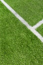 Green artificial grass turf soccer football field background with white line boundary. Top view Royalty Free Stock Photo