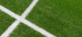 Green artificial grass turf soccer football field background with white lines. Top view Royalty Free Stock Photo