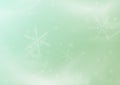 Green asbtarktny gentle winter Christmas background with snowflakes Royalty Free Stock Photo