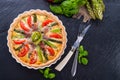 Green asparagi Tart with eggs and tomato Royalty Free Stock Photo