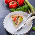 Green asparagi Tart with eggs and tomato Royalty Free Stock Photo