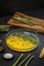 Green asparagus baked with chedar cheese Royalty Free Stock Photo