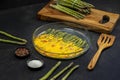 green asparagus baked with chedar cheese and parma ham Royalty Free Stock Photo