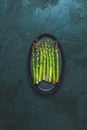 Green asparagus in black metal pan Royalty Free Stock Photo