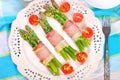 Green asparagus with ham and cheese Royalty Free Stock Photo