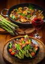 Green asparagus salad with roasted mushrooms Royalty Free Stock Photo