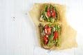 Green asparagus, tomatoes and parmesan gratinated on bread, bak Royalty Free Stock Photo