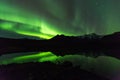 Green aurora light behind Lake mountain in southern iceland europe at national park skaftafell
