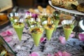 Green avocado cocktail shots served on catering buffet table Royalty Free Stock Photo