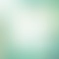 Nature gradient backdrop with bright sunlight. Abstract green blurred background. Ecology concept for your graphic design, banner