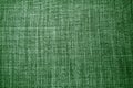 green background fabric texture. A piece of woolen cloth is neatly laid out on the surface. Weave and textile texture Royalty Free Stock Photo