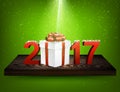 Green 2017 background with gift box.