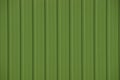 Green background of part of an iron wall fencing