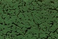 Green background from a soft upholstery textile material, closeup. Royalty Free Stock Photo