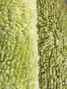 Green background texture fabric Terry towel textile industry macro photo Royalty Free Stock Photo