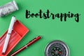 Green background written with text BOOTSTRAPPING Royalty Free Stock Photo