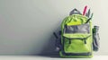 The Green Backpack with Supplies.AI generated image Royalty Free Stock Photo