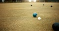 Green, balls and game of lawn bowling on grass, field or pitch in match or competition of outdoor bowls. Ball, moving Royalty Free Stock Photo