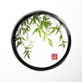 Green bamboo in black enso zen circle.