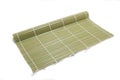 Green bamboo place mat on white background Royalty Free Stock Photo