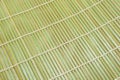 Green bamboo place mat on white background Royalty Free Stock Photo