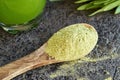 Green barley grass powder - nutritional supplement Royalty Free Stock Photo