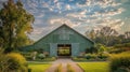 Green barn on farm landscape