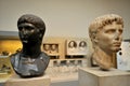 Green basanite bust of Germanicus Caesar and marble statue of Gaius Caesar at the British Museum in London