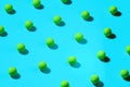 Green Baseball Balls Isolated On Blue Background. 3d Rendering