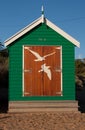 A green bathing box at the Brighton Beach in Melbourne