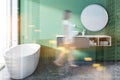 Green bathroom interior side view, woman Royalty Free Stock Photo
