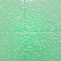 Green Bathroom Tiles With Soap Scum Suds on them. AI Image