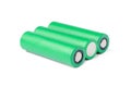 3 green batteries. 18650 batteries on a white background with a perspective. energy concept for devices