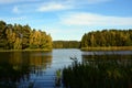 Green bay on the lake in the forest