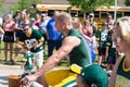 Green Bay Packer Player Riding Bike with Young Fan