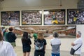 Tourists listen to a tour guide giving tour of Lambeau Field, home of the Green Bay Packers Royalty Free Stock Photo