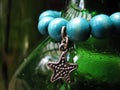 Green Beads with Metallic Star Royalty Free Stock Photo