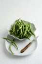 green beans in a bowl with paring knife Royalty Free Stock Photo