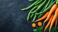 Green Beans and Carrots on a Dark Surface Royalty Free Stock Photo