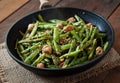 Green beans fried with chicken meatballs and garlic